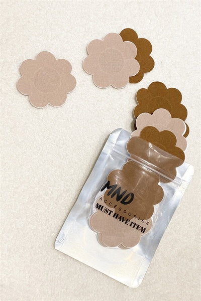 DISPOSABLE NIPPLE COVER
